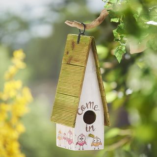 Birdhouse with fire painting