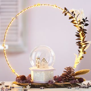 Winterliche Szene mit Metallring