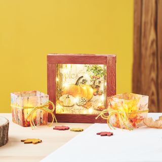 Herbst-Arrangement mit Serviettentechnik