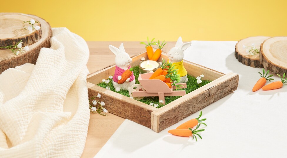 Gegossene Hasen in Miniaturlandschaft