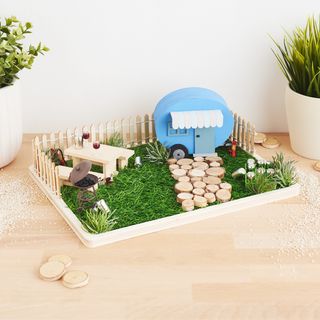 Caravan miniature scene on a tray