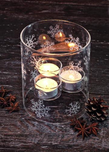 Glaszylinder mit Schneeflocken