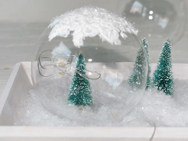 Winterlandschaft: Lichtdekoration fertigstellen Die Lichterketten in die Winterlandschaft platzieren