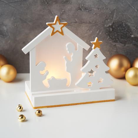 Gegossene beleuchtete Weihnachtsszene